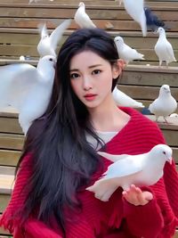 Portrait of young woman looking away