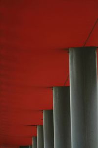 Low angle view of pipe against wall