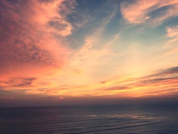 Scenic view of sea against dramatic sky