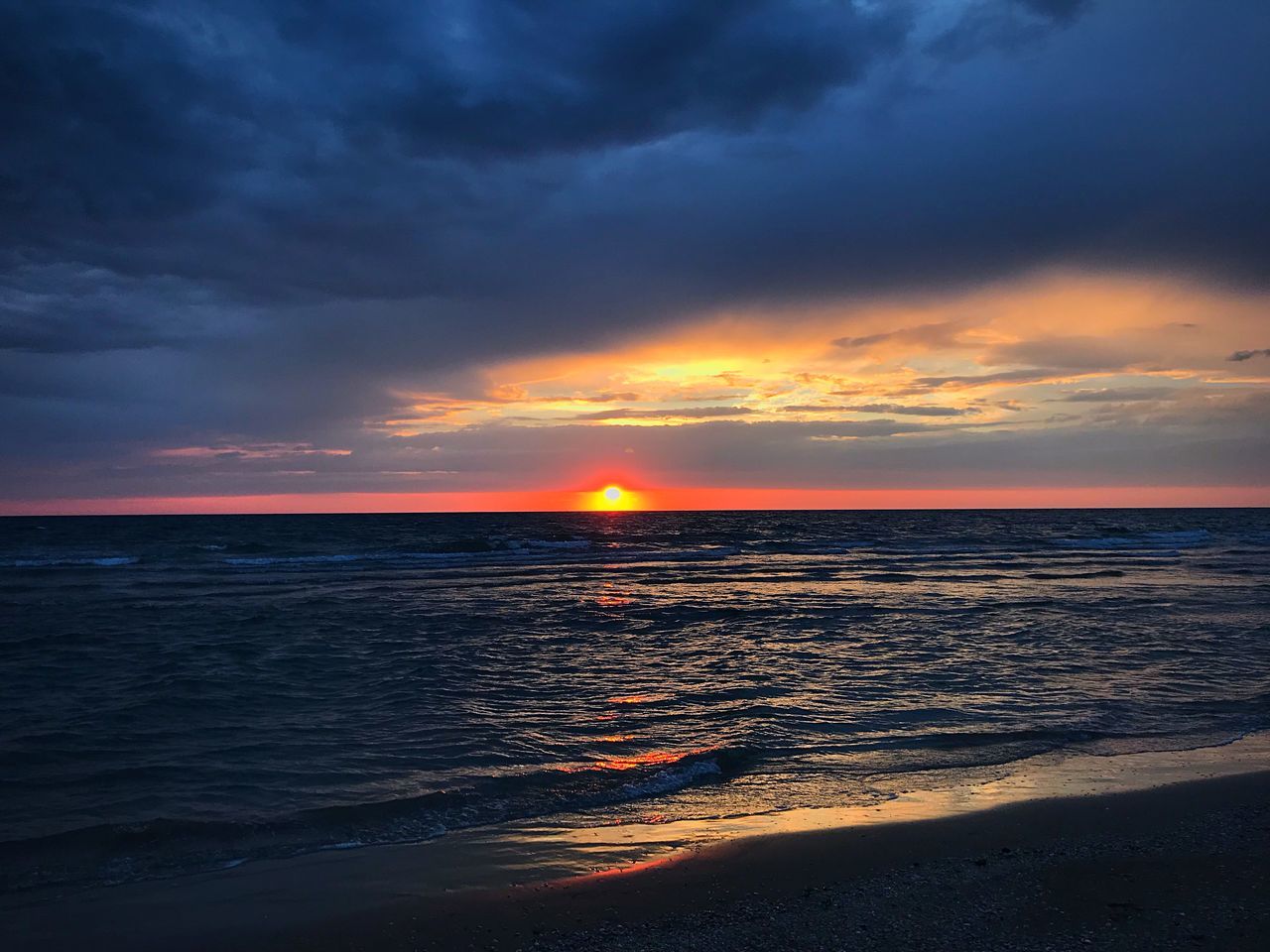 SCENIC VIEW OF SEA DURING SUNSET