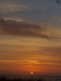 Scenic view of dramatic sky during sunset