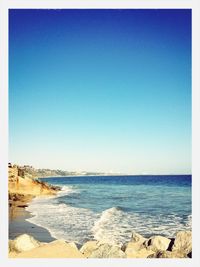 Scenic view of sea against clear sky