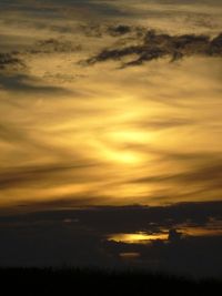 Scenic view of dramatic sky during sunset