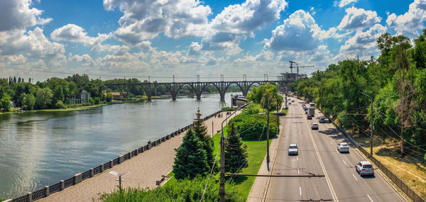 Monument to the fallen afghan warriors on the dnipro embankment in ukraine on a sunny summer day