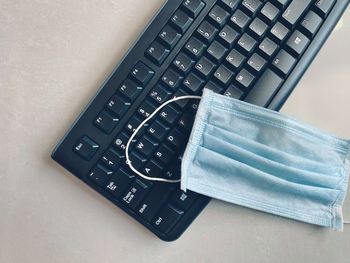 High angle view of computer keyboard on table