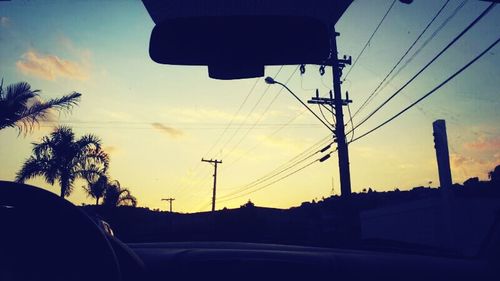 Electricity pylon at sunset