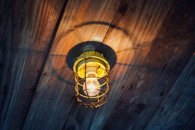 Low angle view of illuminated ceiling