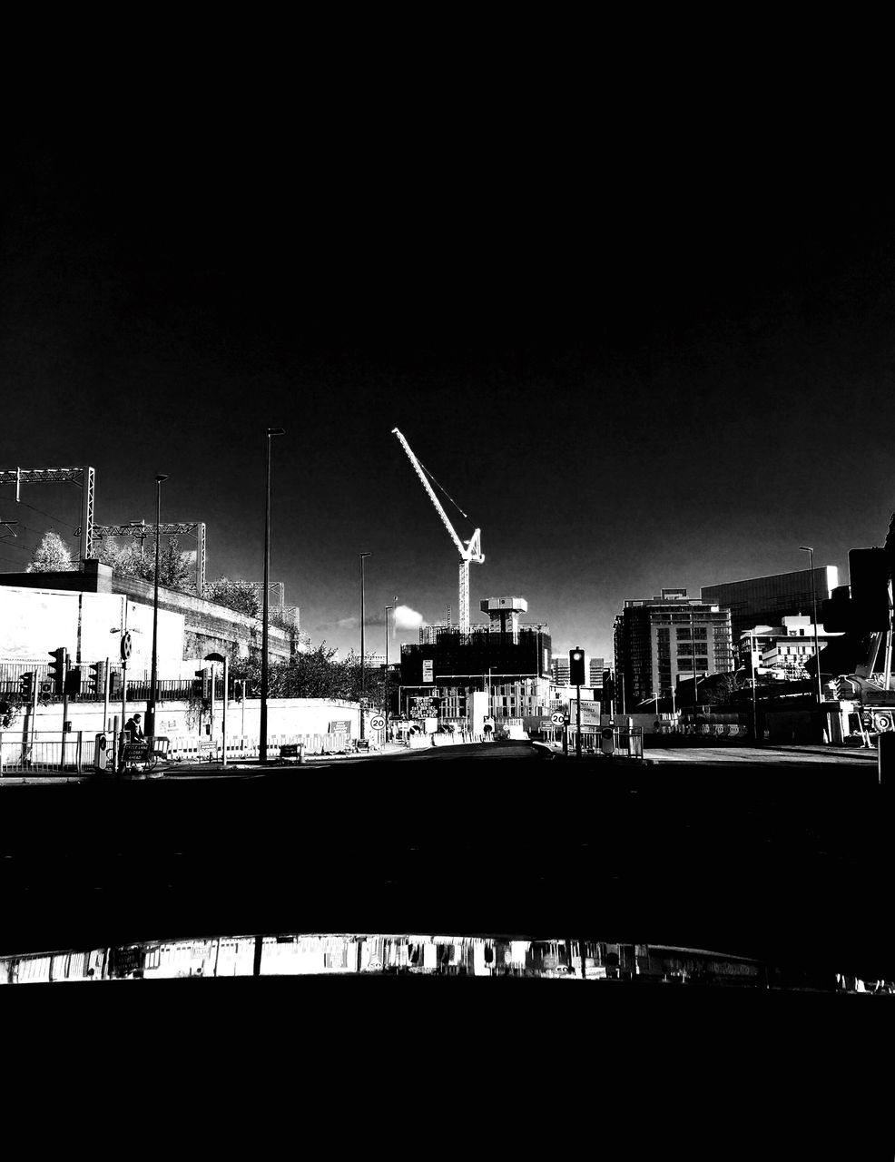 COMMERCIAL DOCK AGAINST SKY IN CITY