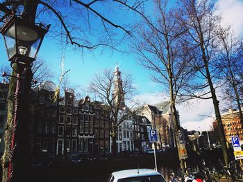 Low angle view of buildings against blue sky