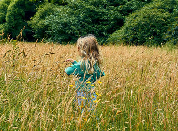 Full length of woman on field