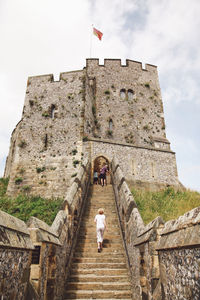 People walking up stairs at arundel castle