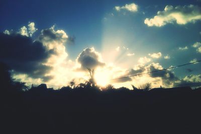 Silhouette of landscape against sky