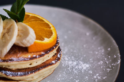 Close-up of cake served on table