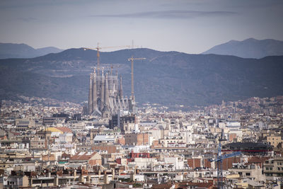 High angle view of townscape against sky of sagrada familia