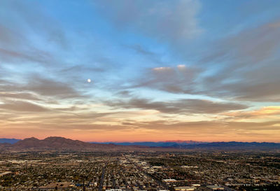 Aerial view of city at sunset