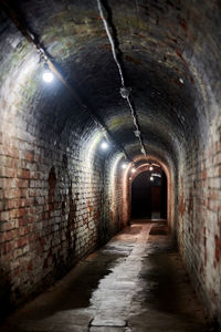 Empty corridor in tunnel