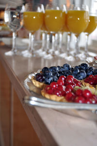 Close-up of blueberry and fruit tarts on table