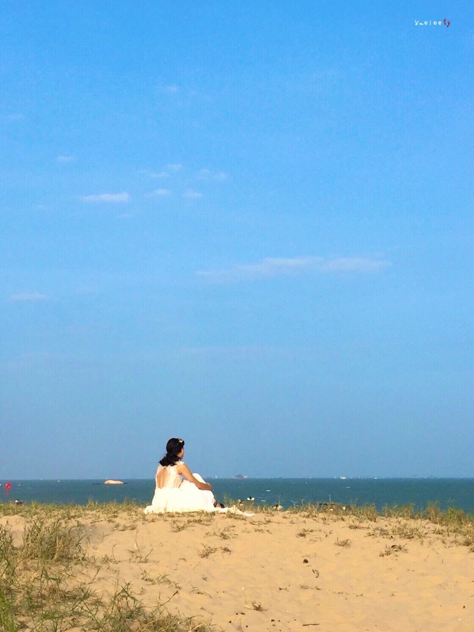 sea, beach, horizon over water, water, sky, sitting, sand, relaxation, nature, leisure activity, one person, beauty in nature, rear view, real people, shore, full length, lifestyles, outdoors, scenics, tranquility, vacations, men, day, adults only, people, adult, only women