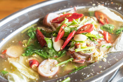 Close-up of salad served in bowl on table