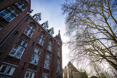 Low angle view of buildings against clear sky