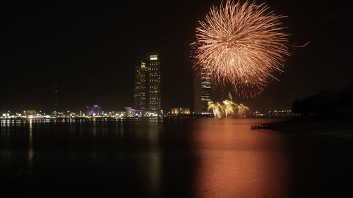 Firework display at night