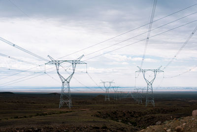 Electricity pylon against sky