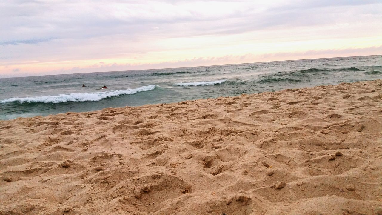 sea, beach, horizon over water, water, shore, sand, sky, scenics, tranquil scene, wave, beauty in nature, tranquility, surf, nature, cloud - sky, idyllic, coastline, remote, outdoors, cloud