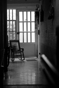 Empty rocking chair on hallway at home