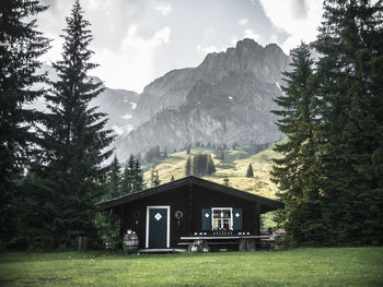 House on field against sky