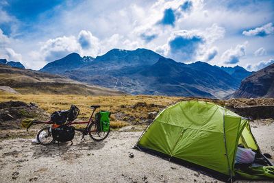 Bicycles parked against mountains