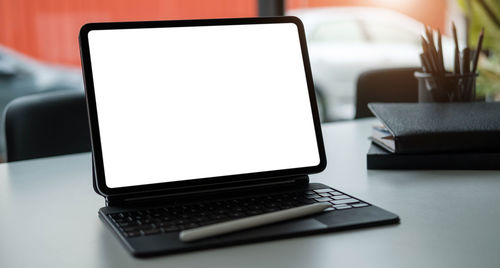 Close-up of laptop on table