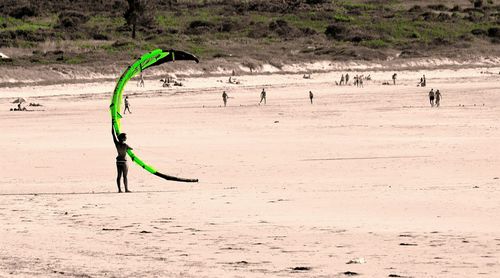 People walking on landscape