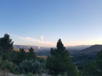 Scenic view of landscape against sky during sunset