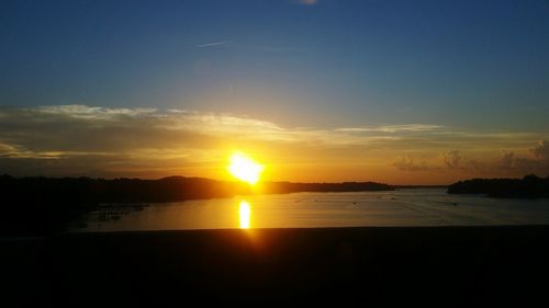 Scenic view of sea at sunset