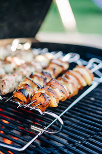 Close-up of meat on barbecue grill