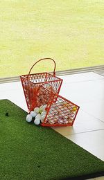 High angle view of wicker basket on table