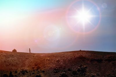 Scenic view of landscape against sky during sunset