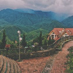 High angle view of trees and mountains against sky