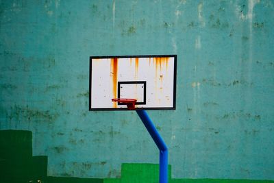 Old basketball hoop in the street