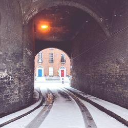 View of illuminated road during winter