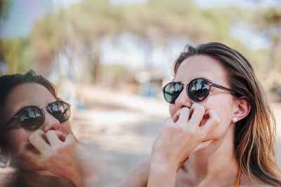 Young woman wearing sunglasses outdoors