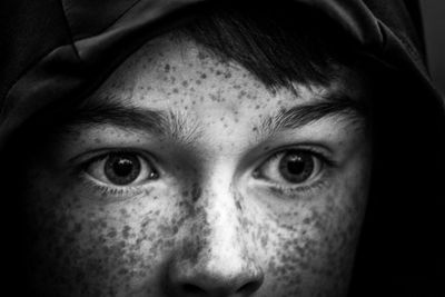 Close-up of boy with freckles