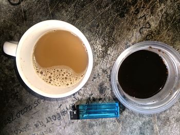 High angle view of black coffee on table