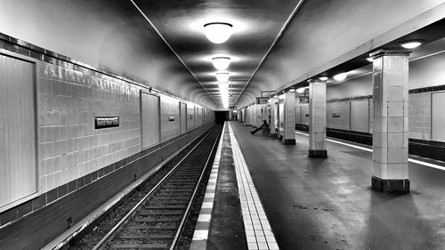 Empty illuminated underground walkway