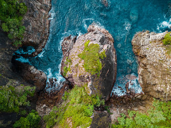 High angle view of rocks on beach