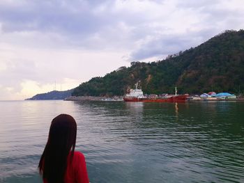 Scenic view of sea against cloudy sky