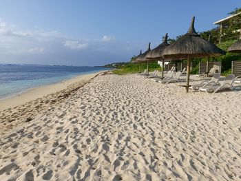 Scenic view of beach against sky