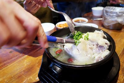 Midsection of person preparing food