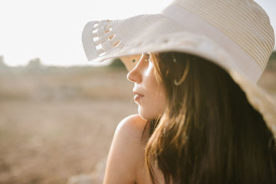 Portrait of woman wearing hat