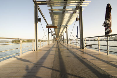 Pier over sea against sky